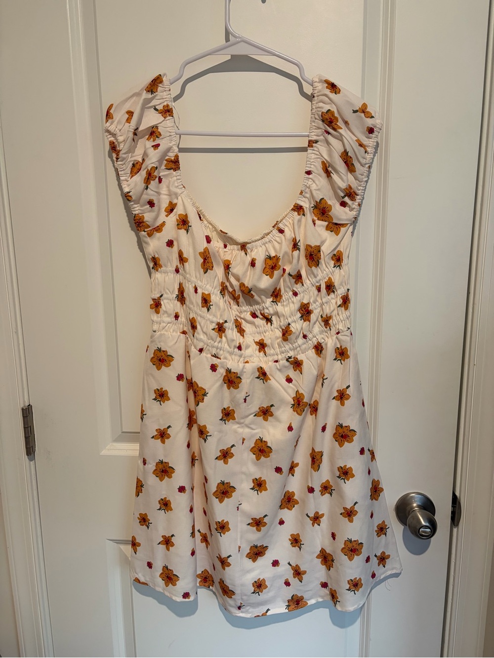 Jilly Floral Smocked Cream Mini Dress with Yellow-Orange Blooms